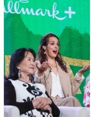 Erin Cahill Instagram - Hello, you wonderful ones! I have been busting to announce this new show coming out this fall!  The show HOLIDAZED will be coming out on #hallmarkplus and I can’t wait for you to see these fantastic episodes!  This cast is a DREAM come true and I am just chuffed!  Thank you @tvinsider for helping announce the show at the TCA’s!  @official_tca It was a joy to do the panel and speak with the press. We really became like a family during the months of filming and that’s thanks to our fearless leader and show runner @ginamariamatthews .  Thank you to all the @hallmarkchannel powers that be who invited me to come play on this magical set!  More to come, but in the meantime, sending each of you love and have a beautiful weekend! ♥️🙌 (Thank you @radmakeup for the hair and make-up glam).