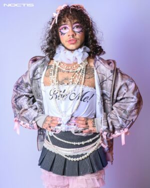 Felix Mufti Instagram - Bratz vibes editorial for @noctismagazine 

Free yourself from expectation and feel fab! I am free from any rules of how I should perform gender. This is an attitude and lifestyle everyone should adapt, whether you are Trans or not.” - @felixmufti 

Netflix’s Sex Education star, activist and multitalented performer @felixmufti discusses Trans representation in TV, freedom of gender expression, his extensive tattoo art, and a love of iconic Bratz fashion for @noctismagazine. Read the full interview on noctismag.com 

Photographer & Photoshop Artist: @danniijophotography 
Stylist: @pretending2besomeone
MUA: @arianacherryy 
Words: @katiemcgoran.photography 
Nails: @nailedbyhotwing 

Felix wears: @marshall.columbia @namedcollective @viviennewestwood @hollysworld.web @dollskill @clouwdez
