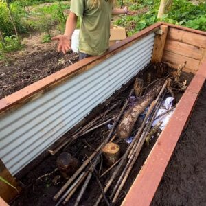 Geoff Lawton Instagram - With the help of Mario and Fabio, Geoff is in the kitchen garden, creating a new raised garden bed using recycled materials. After heavy rains saturated our contour beds, Geoff opted for this practical solution. He started by placing logs and sticks at the bottom for drainage, then added rich soil, compost, and mulch, and finished with seedlings. 

#permaculture #diacoverpermaculture #raisedgardenbeds #organicgardening #gardening #recycling #sustainability #DIY #greenthumb #backyardgardening