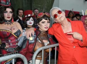 Gina Gershon Instagram - I loved dressing up like Mad Moxxi!!! And clearly Im not the only one!! So much fun to see all you ladies. @borderlandsfilm @picturestart @gearbox opens today!!! #🎩🎩🎩🎩🎩 #moxxi