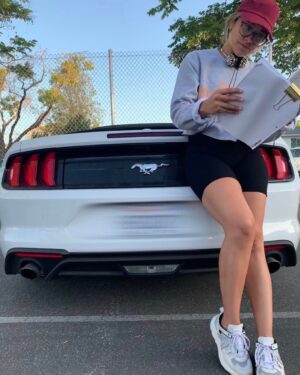 Gina Rodriguez Instagram - Directing such an empowering show requires a powerful ride (#mydadwrotethiscaption #mydaddrivesaford)! Excited to show you all what I’m working on. Thanks @ford for the sweet car to get to and from set every day! #FemaleFilmmakerFriday #FordMustang #Ad