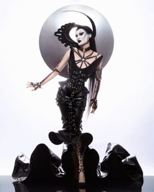 Gottmik Instagram - ⛓️⛓️‍💥SO GORGE⛓️‍💥⛓️
NOW STREAMING EVERYWHERE! 🔥
Thank you all so much for such an amazing season. Being able to come back and show how much I’ve grown as an artist has been nothing short of a dream come true. Releasing skull f*cker and SO GORGE has started a new chapter and I can’t wait to keep traveling and performing these songs for you guys! Cheers to an iconic season and cheers to JUST GETTING STARTED! Love you gorge !! 
This dress was inspired by the McQueen FW 09 horn of plenty collection. I wanted to imagine as if I was designing for McQueen at that time and this look was born 🖤⛓️
Dress @houseofcanney 
Leather full body harness @zanabayne 
Hair @jeanbaptiste.santens 
Photo @sanchezzalba