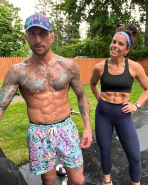 Gregor Gillespie Instagram - How it ended, and how it started. Don’t need much to get peeled… driveway workout 3x 7min lift, 1 min break between each 7 min round. Olympic barbell with 5lb on each side.  1 exercise per min, 7 exercises  per round. 1) squat. 2) shoulder press. 3) bent over row. 4) bench.  5) lunges. 6) hang clean.  7) cheat curls  CANT PUT WEIGHT DOWN UNLESS ON ONE MIN BREAK!  Try to get 40 reps per exercise per min. Try it and comment below and let me know how it went!! (Christina used 15lb dumbbells and I used 45lb barbell with a 5lb plate on each side) it only takes 23 mins so no excuse on limited time!! Short but killer! Comment below on how you liked it!