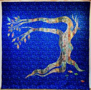 Harvey Fierstein Instagram - And here is my newest. It’s a tree. I made it sewing fabric from strips and then I couched with cotton yarn over the whole thing. I kind of love it. It has a lot of personality. Please note the whole background is quilted in stars and clouds. 104” x 104”.