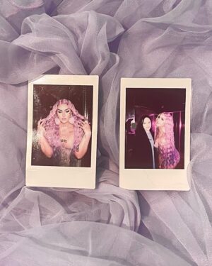 Ilona Verley Instagram - “Life of the party, but the party is finally over”
✨✨✨✨
HELLO INSTAGRAM!
I am so beyond excited to officially announce my new collaboration with @litcosmetics welcome to the stage PARTY GIRL glitter mix!
I wanted to create a shade that was true to my pastel brand & missing from my current glitter collection! 
Party Girl is a mix of different sized glitter to maximize sparkle with a lavender base ranging in holographic / indecent hues to tie into all the fun pastel colors I’m known for serving!
This is my absolute dream shade of glitter & I am looking forward to seeing all the looks you guys create with it! Make sure you hashtag #litcosmeticspartygirl so I can find all your fabulous serves!
✨✨✨✨
PS!!!
Use code ilonaverley-lit20 to save 20% off your entire order when you check out in the @litcosmetics website!!!
✨✨✨✨
Huge thank you to Jodie and everyone at Lit for always supporting my art and showcasing my talent long before I ever made it on tv! 
LOVE YALL SO MUCH!
✨✨✨✨
Couldn’t have put this project together with out the following fabulous friends! So if you like this look and these photos please show some love to the following::::
Photos @megsgiallo 
PARTY GIRL logo also by Meg!
Beaded earrings by @sadndn_ 
Assisted by @theevascarlett 
Big thank you to @numberscabaret for letting us in to shoot in their fab space!
Hair colored and styled by me! 
✨✨✨✨
#drag #instadrag #purplemakeup #purpleglitter #litcosmetics #partygirl #humanhairwig #crimpedhair #trans #browlamination #ilonaverley #canadasdragrace