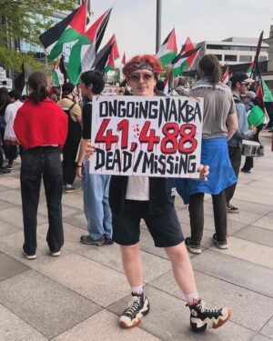 Jamie Hensley-Davies Instagram - 76 years since the OG Nakba, and we’re seeing before our eyes another FAR more catastrophic and deadly ethnic cleansing of the Palestinian people. 

The UK government Is complicit in this genocide. Not only providing Israel with blinded support, but using OUR TAXPAYER MONEY to produce weapons of war sent directly to Israel, and used to kill thousands of Palestinians.
We have the power to stop this. SPEAK THE FUCK UP.

Make signs. Use your voice. Boycott Israeli products. Boycott businesses and people supporting this genocide. Write to your MPs/GOV reps, HOLD THEM ACCOUNTABLE. Camp outside establishments funding this Nakba. Sing songs of justice and liberation. Celebrate Palestinian culture.
PUSH FOR RECOGNITION OF PALESTINE AS A STATE. 

Palestine will be free, because humanity will make it so. Get involved however you can. 

#palestine #palestine🇵🇸 #🇵🇸 #nojusticenopeace #sanctionsnow #ceasefirenow🇵🇸 #nakba #palestinesign #stopthewar #stopbombinggaza #palestinewillbefree #queersforpalestine #artistsforpalestine