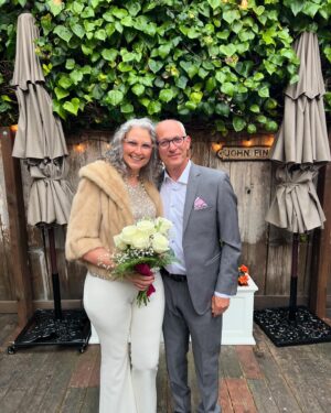 Jen Gunter Instagram - I am not sure what happened to the caption but I think everyone figured it out! I married the love of my life @drjenadjacent.

My son did my make up. My best friends were there. My kids were awesome. And I make my own bouquet from Walgreens that day.