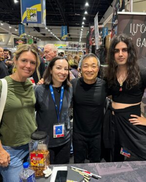 Jim Lee Instagram - Scenes from a comic con, part 1 of 2. Only been a week since @comic_con has passed, & I’m still fondly recollecting all the amazing panels, activations (the Penguin on @streamonmax!), signings & get togethers that were had. 

It was my 35th SDCC & definitely one of the best. Thank you to the organizers of the show for making it one of the most ambitious, energetic & best run shows in the world. Most importantly, I want to thank my beautiful, caring, multitasking wife @joke2far who supported me throughout the long weekend, keeping me on my schedule while simultaneously in contact with all 8 of our children (3 could couldn’t make it unfortunately) who were scattered throughout the convention.  @tajlee @kelseyhannah__ @kaitlinleegarza @ljwrightsthings lucaslee_art @gibs.png @river_c_lee and @jacksontiberiuslee—its always great having you at the show & particularly meaningful to accept my Eisner HoF award with many of you in attendance. 

Also big hugs to my sister @linda_and_ron and her family and our great friends @johndolmayan_ @leasalorraine @kristophergraves @fjdesanto @boryskit @remylean @primeuniversefilms @carriewsuorsa, @fletchforwardes George, @umbertogonzalez @dastmalchian @leah.kilpatrick @eddiemibrahim & Genieve for all your support, help, guidance & simply for being there. Means the world to us! 

Thanks to the patient fans who had commissions & sketches coming to them. Thank you to @johnthomasonlv at @lionfishsd for the generous hospitality & one tequila shot too many! 

I am filled with gratitude that so many former WildStormers @choisez Claudia, Martha, Emiliano & others who made it out for a very early birthday gathering. I know it was a very hard week for all, but it was comforting to catch up & reminisce. 

And finally a big bow to the many incredible, talented creators I had the chance to chat with over the 5 days.  Congratz to @thiendog for his Eisner for ‘Family Style’ (ordered and on its way to me via Amazon!) & the super talented @goraina too. Great catching up with @scottwilliamsinks @sinccolor @ramvwrites @jephloeb3 @ssnyder1835 @joshuawilliamson @tomtaylormade @tomking_tk @lucio_parrillo_art @carlacohenart and so many more…