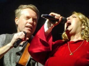 Jimmy Kelly Instagram - Dear Kathy! Happy 60th birthday!🎂🥳🥰 You are a role model for me…to never give up. I thank you for everything you have done for me and all our brothers and sisters all through the years. Your self-sacrifice for the family - especially carrying the heavy accordion for many years when we were small - will never be forgotten. 
You are the Queen of the street! 
You taught me amongst many other things to ‚put the hours in‘ and never give up on your dreams. Sometimes it was peinlich to be your brother but mostly it was/is an honor. I thank God for giving me you as my sister. I am looking forward to keep on singing with you. We will rock til we drop! 😂🤪
Love, your brother Jimmy 
@kathykellyofficial 
#wewillrockuntilwedrop