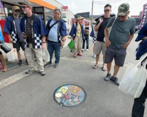 John Daub Instagram - ONLY in JAPAN Bus Tour 2023 <Video> to the Japanese Countryside this September to Katakai for Mega Shell Fireworks 🎆 everyone got OiJ Happi jackets! My guide style vs REAL GUIDE is so different. “Get out your cameras! There’s a manhole cover!!” -John 😂 🕳️