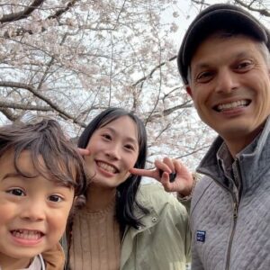 John Daub Instagram - It’s hard not to smile when Tokyo’s looking like this, 100% fully bloomed Cherry Blossoms 🌸 with a 3 year old who loves silly faces, it’s hard to know when he’s really smiling, but today maybe a little easier. The Sakura should be around for a few more days, weather permitting. After the first rain or wind, they usually blow away — and you can catch them again 100km north as they start to bloom up in Tohoku or in the mountains of Nagano. Is the spring better than the fall? I’d say so. Longer days are here again ☀️ and the warmer weather, soon enough.