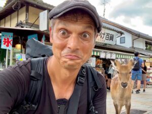 John Daub Instagram - The Deer of Nara 🦌 cannot be ignored, their photobombing has reached a new height. Seriously, I’ve got no Shika Sembei (Deer Crackers) for you mate! Should the city stop allowing tourists to feed the deer? Saw 3 near misses with cars, deer running across roads to get to tourists with food and yet — they’re an inseparable part of the city’s image 😂 cute — but dangerous. Now how do I clean off the bottom of my shoes 💩 before getting on the Shinkansen?