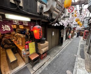 John Daub Instagram - Shinjuku’s alleys are an experience and Omoide-Yokocho is a must-visit. It’s no longer a must-eat since many shops have changed owners, quality is not the same (nor the prices) but walking through there, even in the afternoon, is like going back in time. These shacks came up after WWII from necessity and have evolved a little but still feels like the old Showa era. The name means “memory lane” but had been called “piss alley” in its prime … wonder why 😂 you’ll find more tourists than locals but your photos will be incredible! Golden Gai (old shack bars) is nearby and places like Shinbashi, Okachimachi offer an option to old school outdoor urban eating. In modern Japan though, it’s not common anymore. #shinjuku #omoideyokocho #goldengai #onlyinjapan