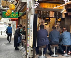 John Daub Instagram - Shinjuku’s alleys are an experience and Omoide-Yokocho is a must-visit. It’s no longer a must-eat since many shops have changed owners, quality is not the same (nor the prices) but walking through there, even in the afternoon, is like going back in time. These shacks came up after WWII from necessity and have evolved a little but still feels like the old Showa era. The name means “memory lane” but had been called “piss alley” in its prime … wonder why 😂 you’ll find more tourists than locals but your photos will be incredible! Golden Gai (old shack bars) is nearby and places like Shinbashi, Okachimachi offer an option to old school outdoor urban eating. In modern Japan though, it’s not common anymore. #shinjuku #omoideyokocho #goldengai #onlyinjapan