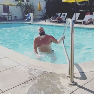 Jon Gabrus Instagram - SKYS OUT THIGHS OUT 
In honor of today’s #HighandMighty about speedos here’s me exiting the pool that @thesweetzerlife filmed.  thanks to @sunga.life for making waist size 40 sungas.
