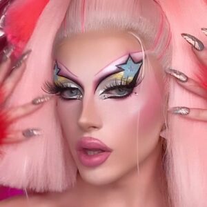 Kam Hugh Instagram - 🩷KIRBY SUCKER🩷
——
For years I have been willing to make a Kirby look!
Well I guess the final of @dragrace_france season 3 is the right place!
Who will win that crown tonight ?
——
my Team:
📸: @ranobrac
👗 @ladymissboo
💇🏼‍♀️ @christophe_mecca
💅 @chloedan520
Earring @jule_et_lily
——
#drag #dragrace #dragracefrance #makeup #kirby #japan