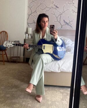 Katie Melua Instagram - Packing for travels and I want the outfits to match the guitar.
Not so easy with a bold azure blue. 
💃🏻😎