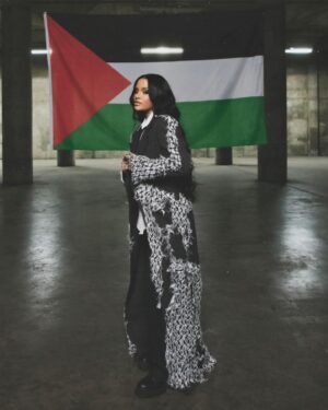 Kehlani Instagram - THE ROLE OF THE ARTIST IS TO MAKE THE REVOLUTION IRRESISTIBLE - TONI CADE BAMBARA

as an artist, i was nervous. terrified. worried after losing so much of what id valued for an album i worked incredibly hard on to my humanity, paired with the crippling wonder of what music is appropriate to drop during the most historical tragedies of our generation. i remembered my favorite revolutionary poets, singers, filmmakers. i remembered how much impact we have. i thought about my favorite James Baldwin quotes about the role of an artist in society. i listened to this song enough to recognize a love song IS a protectors song IS revolution.
thank you @_mynameiscole , my director. for hopping on this project and not holding back, for having a spine & a fire. you executed this beautifully and it was an honor to work with you.
thank you @sallysujinoh , my creative partner in crime. for hiring Palestinians on set. for ensuring every person on set felt safe and for being fuckin THURLLLL wit all things you do.
thank you
@amarimonster my choreographer. amari reached out to me and naturally as she is the most powerul and potent movement artist i’ve ever been lucky enough to see grace a stage... i lept at the opportunity. i was honored to be in your presence and even more honored to be in your corner & under your care. thank you to @brianaandalore my stylist who got all the keffiyah suits made for me and the bros you killed it.
To my dancers, nobody pussy round heaaaa! nah you’re all so incredible i’m in awe of you and im blown away. i love you all
deeply. i love everyone deeply.
this was merely a reflection of pain. of anger. of support. a lens. a long ruminating energy. a reflection of the pink washing, the silencing, the negative portrayal, the fear mongering. there is gentle where is fierceness. there is beauty in the radical. i’m scared shitless by the way. i’m just tryna be where my
feet are. here, now. always & forever. 

NEXT 2 U video out everywhere now.