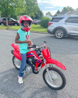 Keivonn Woodard Instagram - My favorite uncle Lurendran from Houston taught me how to ride my Honda 2023 CRF 110F for first time! I learned in less than 5 minutes 😁 #vrooooom #Honda