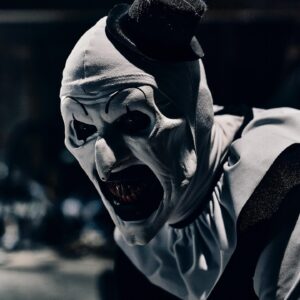 Lauren LaVera Instagram - Ahead of this week’s San Diego Comic-Con, USA Today is the first to preview four brand new images from Damien Leone’s slasher sequel Terrifier 3, which opens in theaters everywhere on October 11. In addition to the first batch of stills, we’re also excited to announce that the teaser trailer and poster will be released this Wednesday during San Diego Comic-Con!

The images are striking, offering an up-close look at Art the Clown and everyone’s new favorite final girl Sienna, plus Victoria Heyes, who is set to become a horror icon in her own right in Terrifier 3. Another new image shows Art getting ready to rock around the Christmas tree in a Santa Claus outfit. Check out the new images below and expect the teaser trailer on July 24.

Additionally, head over to USA Today for fresh insights from Damien Leone.

In Cineverse and Bloody Disgusting’s Terrifier 3, directed once again by Damien Leone, Art the Clown (David Howard Thornton) is set to unleash another round of chaos on the unsuspecting residents of Miles County as they peacefully drift off to sleep on Christmas Eve.

Returning cast includes Lauren LaVera (Sienna), Samantha Scaffidi (Victoria Heyes), Elliot Fullam (Jonathan Shaw) and AEW superstar Chris Jericho (Burke), with Daniel Roebuck set to debut as Santa Claus. Makeup effects legend Tom Savini, Jason Patric, Antonella Rose, Krsy Fox, Clint Howard, and Jon Abrahams also appear.

Terrifier 3 opens exclusively in theaters nationwide on October 11, 2024.