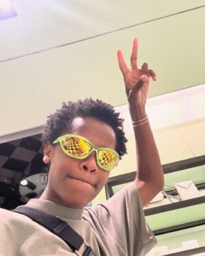 Letitia Wright Instagram - life lately/photo dump. 

might delete later, See you in 6 months 😅

1. The MOVE Party ~ 🎞️ @artvomit 
2. I’m forever trying on glasses at Prada. 
3. MORE LIFE ~ new grills from @plygrnd.ldn 💎
4. @valerianspicer always helping me improve! 
5. Location scouting in the middle of God knows where. 
6. Skin care by any means necessary 😤
7. Skipping in Kenya with the boxing team for like 20 mins straight….fam
8. Football with some young Kings in Malindi 💙
9. Somewhere in Lisbon. 
10. My fav @chancetherapper song…dont judge my singing voice.