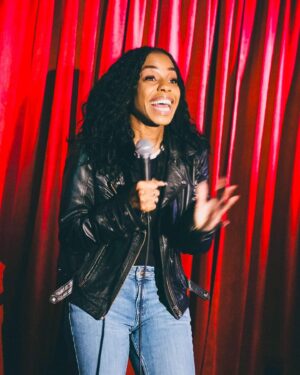 London Hughes Instagram - Been a stand-up for 15 years. Still haven’t mastered how to look cute and tell jokes at the same time. 😩

📸. @calliebphoto
