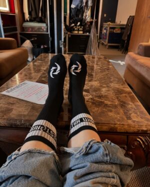 Lzzy Hale Instagram - A personal favorite merch item that I’ve been wanting to do for ages….is now a reality. HALESTORM SOCKS! So soft and comfy, perfect for my rock boots! Available now! #socklife #bunksock #wikifeet #docsocks #rocksocks #halestormmerch