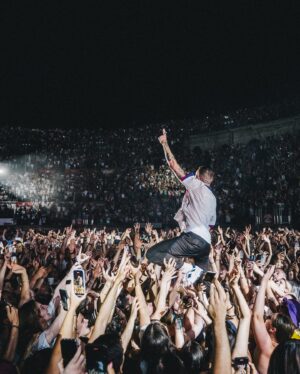 Macklemore Instagram - My Grandma use to always say MercI beaucoup. Even with dementia, it was one of the last phrases she held onto before she transitioned. I always think of her in France, as it’s one of the only French words I know. She was with me in Nimes the other night. Sold out the Coliseum. Merci beaucoup Nimes 🇫🇷❤️… that was perfect