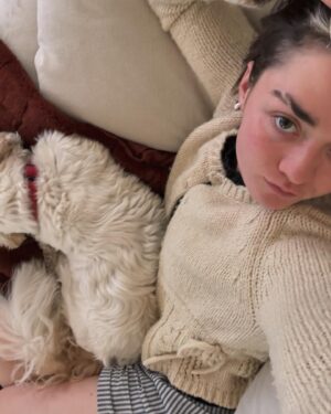 Maisie Williams Instagram - a love triangle between me, my dog, and my @peachyden cardigan x