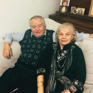 Mary Louis Kanellis-Bennett Instagram - My YaiYai passed away on Monday. Maria Kanellis, my synónymos, was 95 years old. YaiYai was an incredibly strong, hardworking, and fearless woman from Sparta, Greece. YaiYai never learned to drive so when she would babysit us, we would walk everywhere. And even still she would be in a skirt, blouse, scarf, clip on earrings, and kitten heals. She used to garden with her bare calloused hands and a kitchen knife in a skirt and loved to play cards while drinking ouzo. She and my Papou came to America to build a life together and they did. An incredible life, YaiYai and Papou were married for over 60 years, they owned 2 restaurants, raised 2 children, 5 grandchildren, and had 8 great-grandchildren. Papou passed away in 2020 but, I’m sure they are together again. Arguing loving about whether or not the door is closed or about the coffee. Declarations of nai. But S’agapò just as much. YaiYai called my husband Mike, the fighter. But, in the end and all through life she was the real fighter in the family. YaiYai defended her family fiercely and I heard many stories of kindness from her surviving siblings at her funeral yesterday. The last thing I said to my YaiYai was “it was a good life” because it was and it is. I cannot imagine the sacrifices that my grandparents must have made leaving behind everything they knew. I am sad she is gone but more than that I am grateful. So grateful for the years. Grateful for this beautiful life. Grateful for the sacrifices because you gave us the good life. Now Rest. You both gave everything to us. And I’m grateful. 

S’agapò YaiYai.