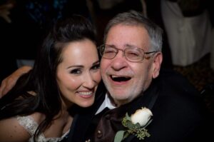 Meredith Eaton Instagram - We lost him four years ago today, and if I sit quietly for even 30 seconds with that reality... well I just cry. My dad was the most positive person I have ever known. Despite all that life threw at him, and he got thrown many curveballs, the smile you see in this photo is the smile that was almost always present. He was a teddy bear of a man, with the cutest laugh you ever heard, and he was a sports fanatic. He held season tickets to both the Yankees and the Mets, but the best were the Knick games with him at the Garden. He would walk with his forearm crutches  up loads of stairs, just for the best view in the place. I recognize how lucky I was to have him as my dad. I miss him so much. The Honorable Judge Leonard Eaton.
