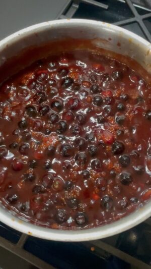 Mike Pecci Instagram - Making homemade blueberry bbq sauce. Listen to the podcast for the full recipe on how to smoke baby back ribs. @inlovewiththeprocesspod