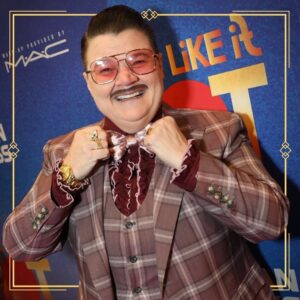 Murray Hill Instagram - "Holy shit! ⭐️⭐️⭐️⭐️⭐️ A full-blown classic old-school new-school showbiz TRIUMPH!" Pals, @somelikeithotmusical on Broadway is a SHOW! If u love showbiz-singing, dancing, tapping, and laughing as much as I do, go see this HIT show for a much needed jolt of razzle dazzle! In awe of the cast and the mind-blowing music & lyrics from @scottwittman @marc_shaiman! 🎊 to @amberruffin @matthewmichaellopez for the hilarious book! 🎭 The choreo is next level 👯‍♀️ Luv ya @jharrisonghee - I see you!  #showbiz #broadway 
.
Ruffles: @cegonyc 
Specs: @caddis_life 
Pomade: @layriteofficial 
Suit: Mr. Ned
Dbl chin: Me