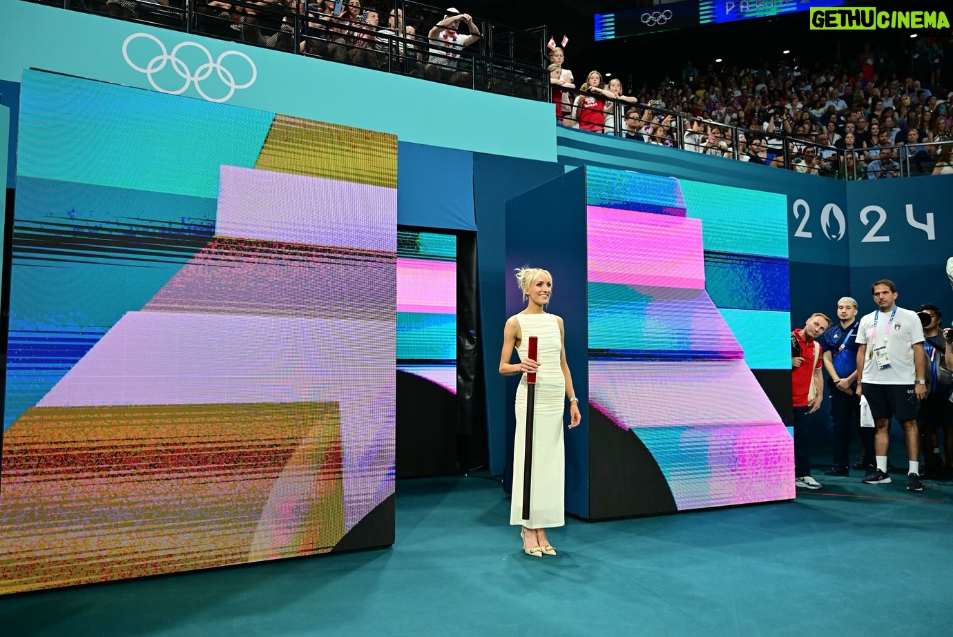 Nastia Liukin - 59.2K Likes - What an incredible honor to have been asked to perform “Les Trois Coups” last night at the Women’s Team Finals… Thank you so much @paris2024 🤍 It was truly the biggest honor.
For those who aren’t familiar, “Les Trois Coups” is inspired by the tradition of French theater, to signify the start of a performance, that the show will begin shortly.. This local tradition was carried over to the Olympics to open and being each competition and sport at the Paris 2024 Games.
PS @johnkcheng with the ultimate framer of the night… without even realizing it in the moment – keep scrolling / zoom in far right to see my dad who happened to be trying to walk by at this exact moment to only be asked to please stop because someone was coming out of the tunnel - to then seeing me and mostly likely wondering what the heck I was doing walking into the arena of the olympic team final… in a DRESS lol