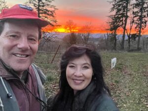Nicholas Kristof Instagram - Walking the dogs on The Most Beautiful Farm in the World this evening. Oregon does have lovely sunsets, at least when there is a sun. Connie, who is Chief Security Officer at @kristoffarms, is inspecting gopher holes and weighing war strategies against the rodent armies.