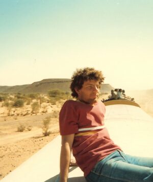 Nicholas Kristof Instagram - My weekend column for the @nytimes encourages young people to travel off the beaten path, to build perspective and empathy. My own youthful travels shaped my life and career and made me more attuned to human rights issues. Here I’m riding on the train in north Sudan to Khartoum. Fortunately, there were no tunnels.