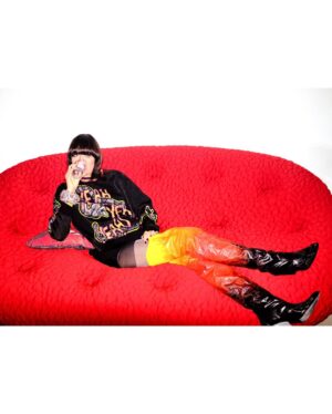 Nick Zinner Instagram - I shot these 🔥 images of @ko in this unbelievable @wah_wah_australia sweater celebrating 20 YEARS of Fever To Tell . (order link is on the wahwah ig page) 📸 🖤