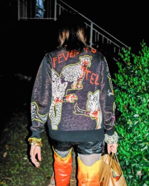 Nick Zinner Instagram - I shot these 🔥 images of @ko in this unbelievable @wah_wah_australia sweater celebrating 20 YEARS of Fever To Tell . (order link is on the wahwah ig page) 📸 🖤
