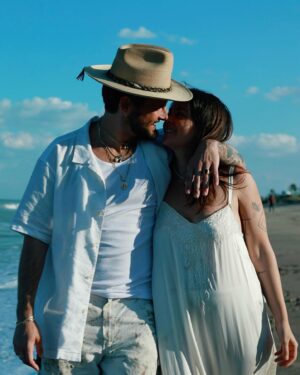 Nico Tortorella Instagram - We’ve got some big news: We’re having another baby!

This era has been all about transition, bending and shifting in order not to break. We left everything familiar to find something new—somewhere the grass really is greener because the sun shines more. We did it. We moved to a place where we can grow food year-round, where we can run barefoot, chase lizards, play in the ocean, and literally stop to smell the flowers. Somewhere we can continue to build our family.

The very day we arrived at our new house, we made a baby. Really, it’s true. It’s funny how, when you commit to dreams and embrace changes, miracles unfold.

Today’s a big day with a lot going on:

- My children’s book ‘Olivette is You’ launches today! @randomhousekids 
- I’m on the wonderful podcast @notskinnybutnotfat which is live right now!
- Also, my album ‘Born.’ drops this Friday, complete with a very special music video all about being pregnant.🔻🔺

Despite all this, seemingly none of that matters. Right now, this moment is a celebration of life at a time when life itself seems the most fragile.

Bethany, thank you for creating the space to continue to grow our family. We are nothing without you. I am constantly in awe of your strength and willingness to expand. And Kilmer Dove, get ready girl—it’s big sister energy from here on out. I love you both. I love all of you. All of it is you.

📷 by @rocco_tortorella