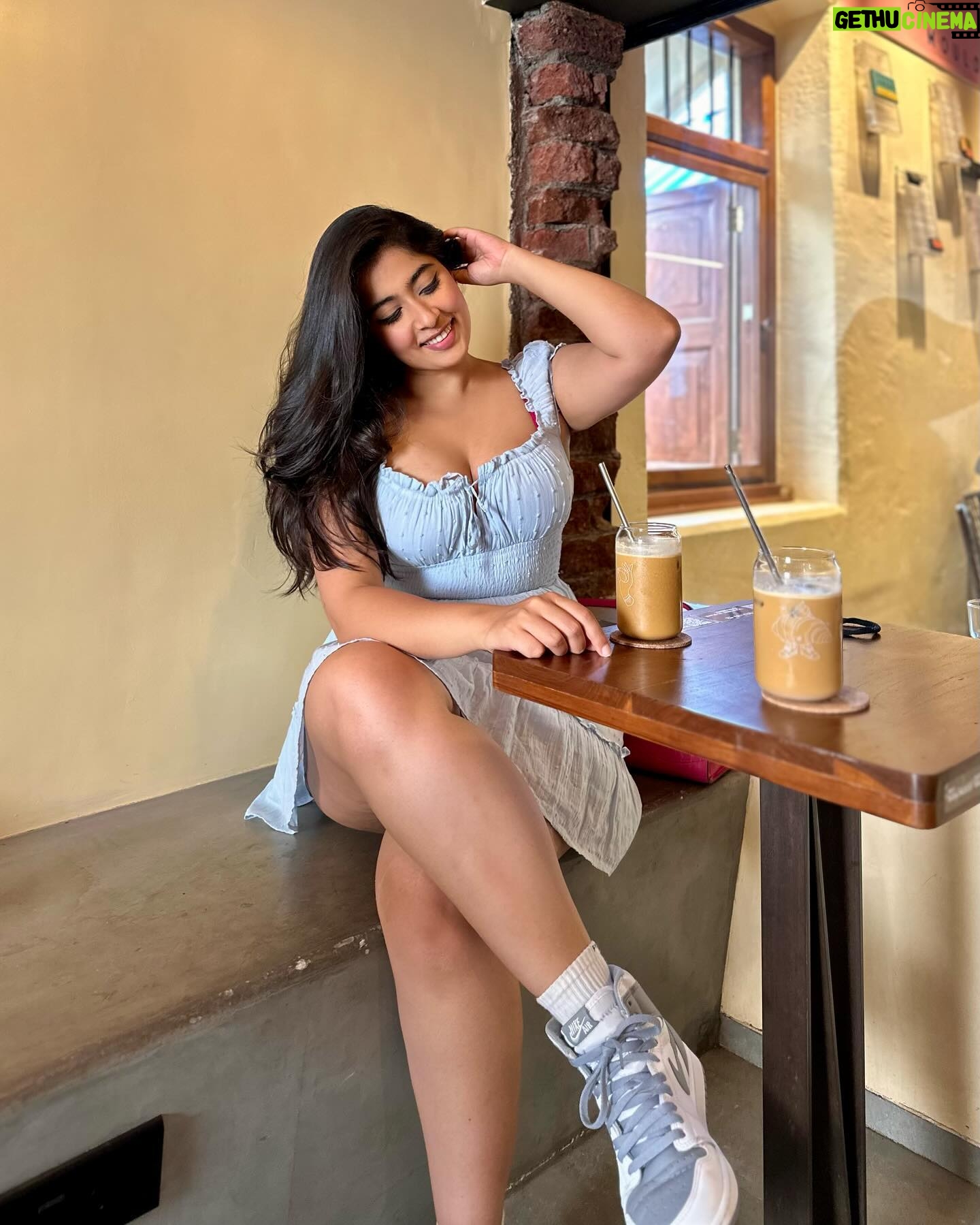 Nikita Sharma - 97.1K Likes - A cute little dress, a pair of Jordan’s, and my cup of coffee makes for the perfect Bombay day out! 🩵