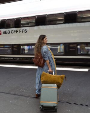 Nikki Reed Instagram - I have been dreaming of this trip for a decade and after a year of planning and organizing with @myswitzerland , it’s finally here. Switzerland Tourism asked me to join them to explore this gorgeous country, documenting their sustainability initiatives and ways to navigate this entire region with a smaller footprint and bigger impact aka, Swiss-tainable travel! I will be highlighting the country’s unparalleled approach to low footprint tourism and everyday living, getting to know the farmland while documenting the intimate connection between farm and restaurant throughout different regions, and using the Swiss travel pass to go from train to ferry as I trek across the country with two cubs on my back. What an honor to see this gorgeous part of the world through the lens of sustainability…pun intended! 
Ps To all the lovely people who watched with compassion as I wrestled a tiny bear cub who was determined to move about the airplane cabin on all fours, thank you for your kindness. This tired (and very excited) mama is ready to explore :)!