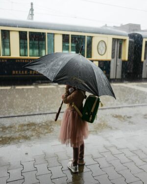 Nikki Reed Instagram - Traveling by train…my new favorite way to get around. Changing regions every 48-72 hours with 5 kids and luggage sounds daunting, but it has been nothing short of amazing largely due to the efficiency and simplicity of this mode of transportation. Some of my most treasured memories thus far have been on trains. The Swiss Travel Pass gives you unlimited access to all the trains, buses and boats via a little QR code you save on your phone. So simple. You show up, and jump on. I just read that over half of commuters here use this way of transportation to get to work everyday, and I am not surprised. Second to walking/biking, it really is the most environmentally conscious way to get around which adds to my fondness for Swiss-tainability.  Not only is it a much more sustainable, it is also one of the most relaxing experiences once you get the hang of it. I worked during each ride, glancing up at the most gorgeous hillsides and lakes, baby napping in a carrier on my chest, big sister playing with her buddies, and all I know is everything about this just feels right. Traveling by train, being conscious of what is better for the planet and the soul…🛤️🌳🌿
Ps While it’s true, I was excited to get fancy for the Golden Pass Train, I am also so grateful for bts moments like that last slide that are rarely captured, which show snippets of life in the most real way. The majority of our rides my cameras are tucked into my backpack, we are baby wearing, working, big kids playing, drinks spilling, changing trains while changing diapers and loving every minute of the (not documented) chaos :)🫶🏼🥹