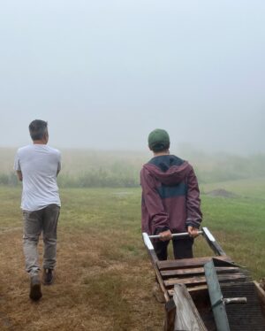 Ocean Vuong Instagram - immense harvest of wild blueberries this year. rose at dawn to gather them with dear friends as the fog closed in around us, and with it the sound of rakes breaking the rye, the muffled bumps of berries filling the trough, and underneath that the silence suddenly so dense you feel it in your fingertips, which meant the sadness was filing in too. there should be a word for the kind of sadness you’re somehow grateful for, the one that points at your chest and says “there you are, little fugitive, hiding yourself in the field of bounty on the verge of ignition.” how is it possible, to be full to the brim with gratitude and yet still at a loss for it all? is there a word for sadness so gentle you might wanna keep it, just for a little while? 🫐🌱