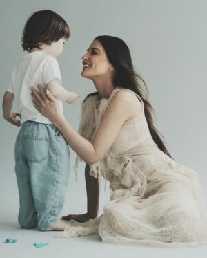 Olivia Munn Instagram - I was happy to share a little more about my journey, my family and what the future holds with @voguemagazine.

I recently had my fifth, and hopefully final, surgery in my battle against breast cancer. (Last surgery was an oophorectomy and hysterectomy) 

I hope by sharing this it helps other women who are fighting this terrible disease feel less alone. 

Thank you @margaux_polaux for the genuine connection throughout our discussion and for approaching this with such passion. Thank you @tessayano for the beautiful photos of me and my Malcolm. 

Link to story in bio. 

Writer @margaux_polaux 
Photographer @tessayano 
Stylist @kristinakoelle_ 
Makeup @danielmartin 
Hair @gonn24