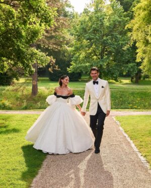 Olivia Palermo Instagram - @OliviaPalermo first met @JohannesHuebl back in 2008 through a mutual friend at a movie screening in New York City. The two began dating that November, and this year marks their 17th year of being together and their 10th year married. “I proposed to Olivia on New Year’s Eve in 2013 while we were on holiday in St. Barth’s,” Johannes remembers. “It was just the two of us in an idyllic setting and a very special moment.”

“Going on six months of our engagement with no real break in our schedules in sight, we decided to just get married and worry about the big wedding moment later,” Johannes admits. That big moment just happened to come 10 years later. “We had always planned to do a wedding—I love weddings—but life was just so hectic at that point in time that we never got around to actually planning one,” Olivia explains. Their milestone weekend in Germany at the end of June was the reception they never had. Tap the link in our bio to see more from the couple’s celebration in Baden-Baden, including more on Olivia’s three @giambattistavalliparis looks. Photos: @jeffthibodeauco