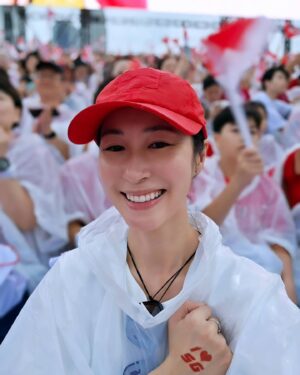 Paige Chua Instagram - Nevermind the rain, we are going to your party, 🇸🇬 
Together, we will brave the storm.

Happy birthday,Singapore!!❤️🎂

#ndp2024