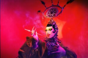 Pythia Instagram - 🔮THE HIGH PRIESTESS🔮 
Outtake from the ORACULUM promo shoot coming December 1-15 at @buddiesto! 👁️🪐✨🌜

Art Direction/Photography: @franznfriends
Photography Assistants: @kristanewey   @b.cair
Picture Edit: @pythia.queen 
Dress: @_thesukidoll 
Headpiece and accessories: @pythia.queen