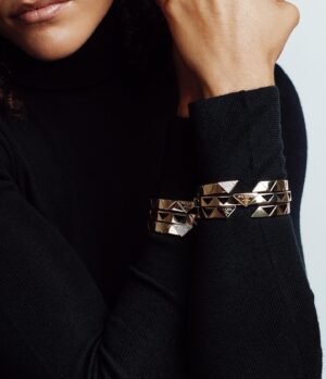 Quintessa Swindell Instagram - Excited to share a lil something with Prada, the first global brand to use 100% certified gold standards for their sustainable jewelry collection- Eternal Gold. <3 #ad @prada #PradaFineJewelry 🖤