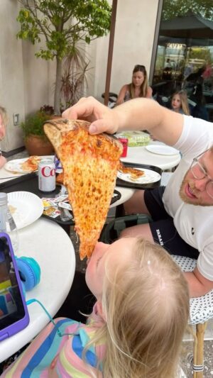 Rob Beckett Instagram - After my kids had Pizza Express four days running this week due to various reasons involving lack of parent communication and summer holiday fatigue.  I’m gonna be talking about weird food rules and habits on my @bbcradio2 show. I want to know what yours are! 🍕 🥣 🍝
Can you have cereal in the evening? Is chicken before midday ok? Does your colleague eat the same lunch every day at work? What CAN’T you have ketchup with? What’s your guilty pleasure?
Reply below 👇 or email rob.beckett@bbc.co.uk
P.s this photo is from a USA trip PE haven’t started doing giant slices
