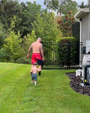 Ronnie Arneill Instagram - We work. 

Then we play. 

#myson